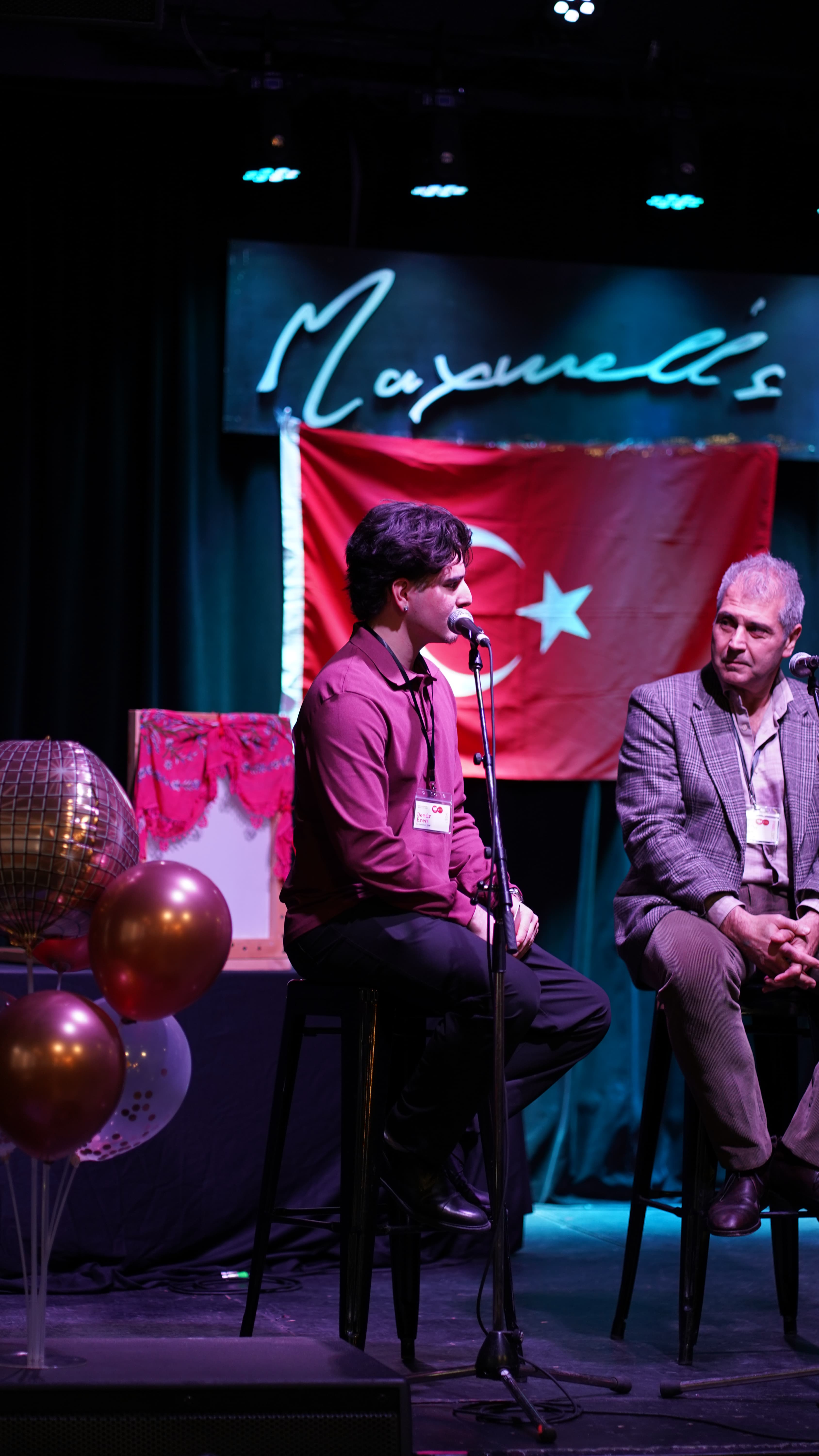 Demir on stage at TSA Careers Night, Maxwell's Waterloo